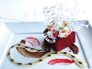 ade Red Velvet Cake - centered with Grand Marnier Chocolate ganash, complimented with an orange cream at Ascots.