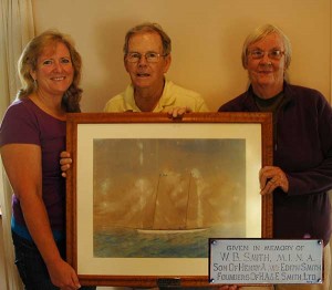 Roger Davidson, flanked by his wife Lee and his daughter Jennifer, presented the Edward James painting of a Bermuda Pilot Gig to the National Museum.